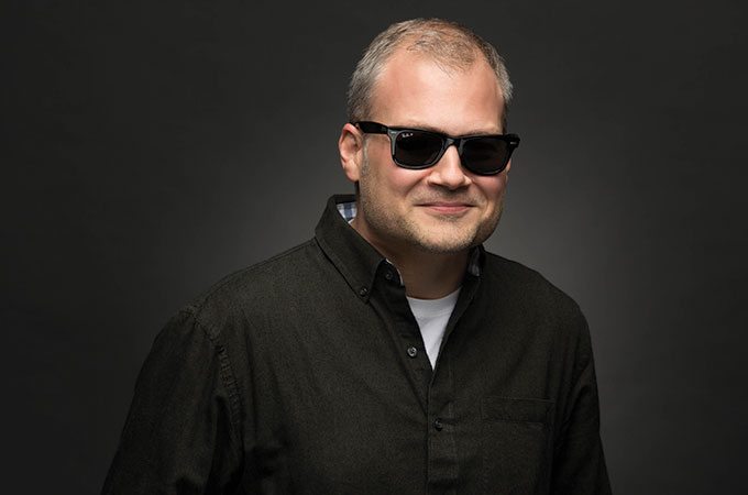 Jon Doss wearing sunglasses