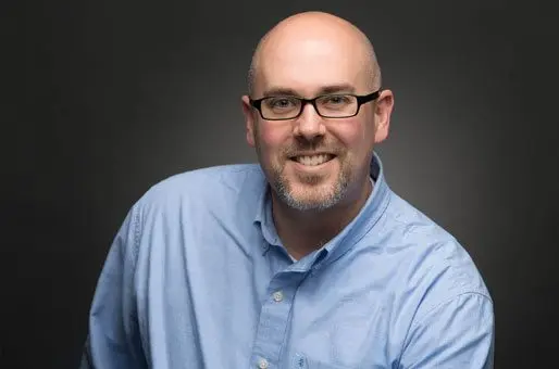 David Hosay, Project Manager at Sublime Media Group, smiling