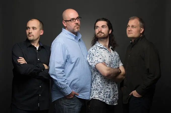Sublime Media Group video puppet production team posing like super hero