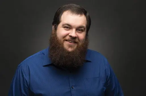 Sublime Media Group Senior Web Developer, Ross Brown, smiling