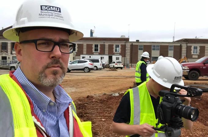 Sublime Media Group Project Manager David Hosay on a video shoot at BGMU work site with videographer Nick Johnson in Bowling Green, Kentucky