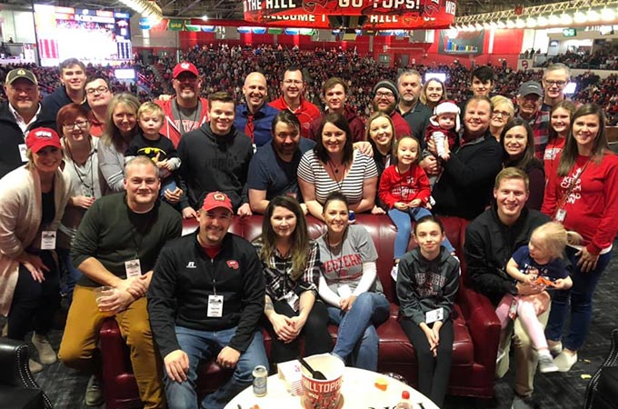 Sublime Media Group family and friends in the hospitality suite at 2019 WKU vs Arkansas Basketball game in Diddle Arena.