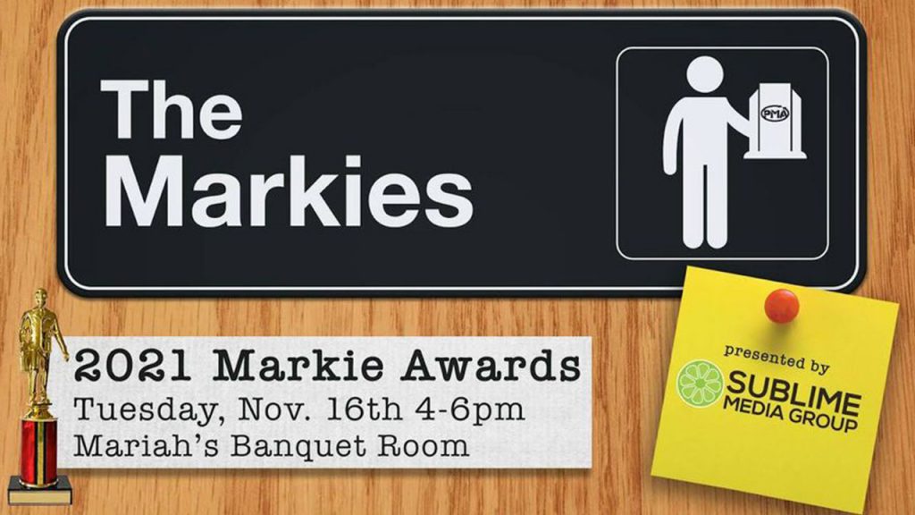 Event graphic saying "The Markies" on an office wall sign