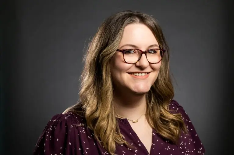 Sublime Media Group Social Media Manager, Kayla Bitner, smiling