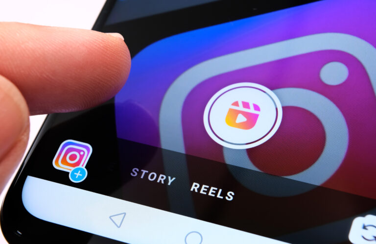 a cell phone with a close up of the reels button on the instagram app