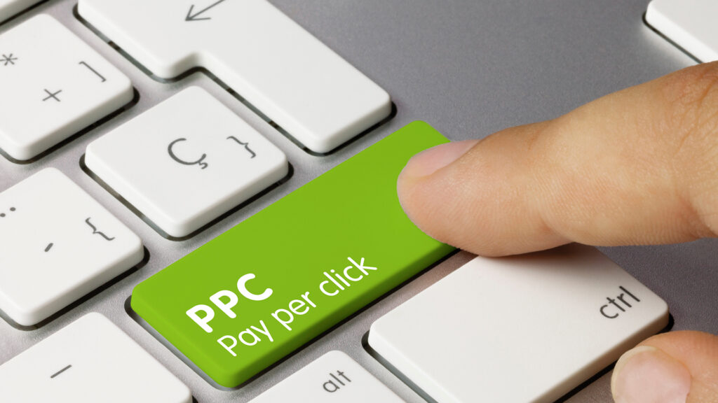 pay per click green button on a keyboard